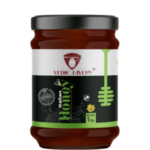 "Jar of Italian Bee Honey with a light golden color, known for its mild sweetness"